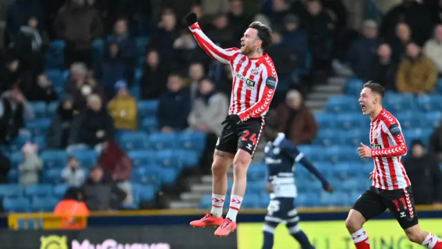 Aaron Connolly celebrates