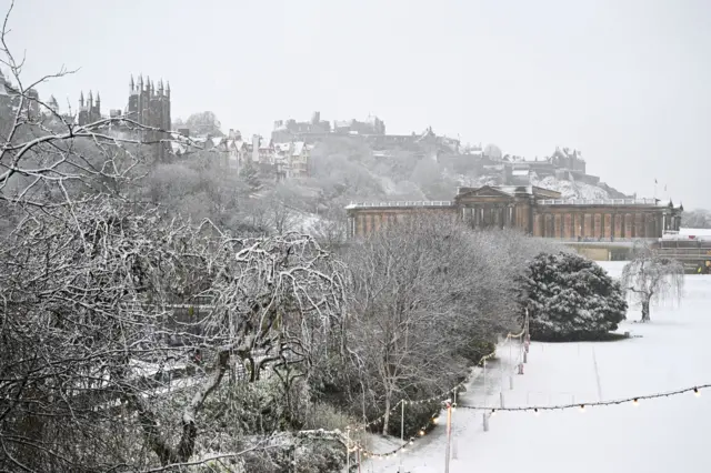 Edinburgh Castle and the National Galleries seen from the east with heavy snow everywhere