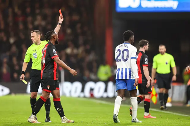 Referee Stuart Attwell sends off Carlos Baleba of Brighton & Hove Albion