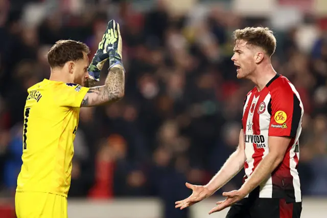 Mark Flekken and Nathan Collins of Brentford celebrate