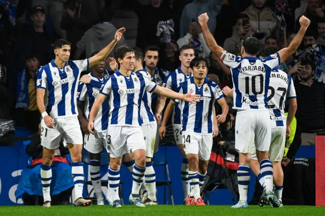 Real Sociedad celebrating after scoring against Barcelona