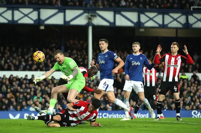 Jordan Pickford of Everton is fouled by Christian Norgaard