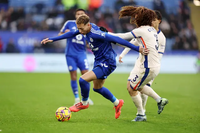 Kasey McAteer of Leicester City in action with Marc Cucurella