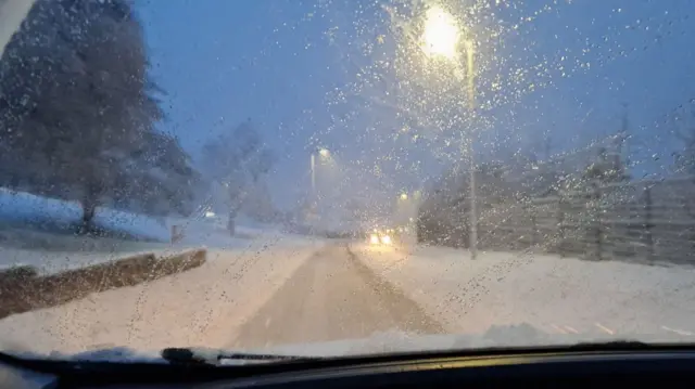 A view of snow on a road at Greenock