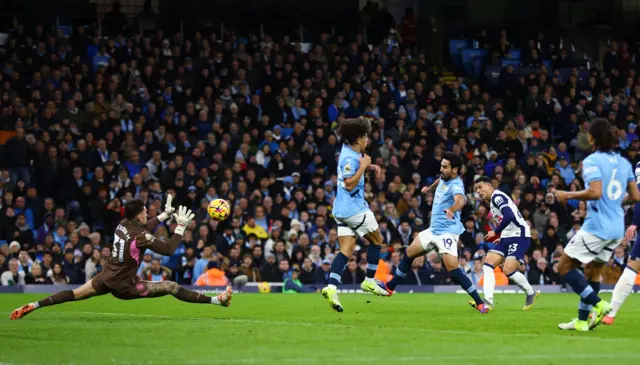 Tottenham Hotspur's Pedro Porro scores their third goal past Manchester City's Ederson