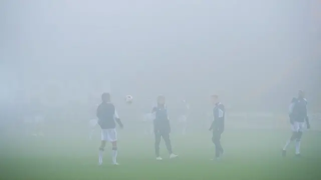 DUNDEE, SCOTLAND - NOVEMBER 23: Fog rolls in during a William Hill Premiership match between Dundee and Hibernian at the Scot Foam Stadium at Den's Park on November 23, 2024, in Dundee, Scotland. (Photo by Euan Cherry / SNS Group)