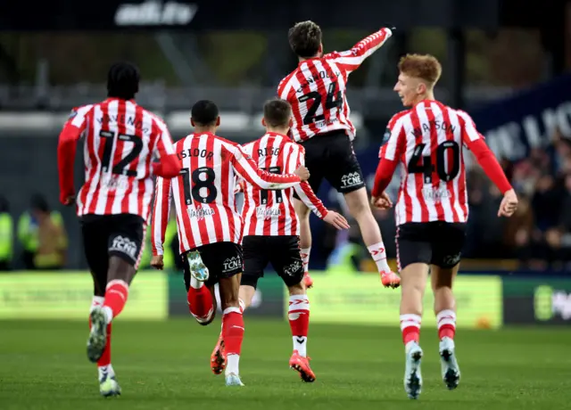 Sunderland's Aaron Connolly (centre) celebrates after scoring his side's first goal of the game