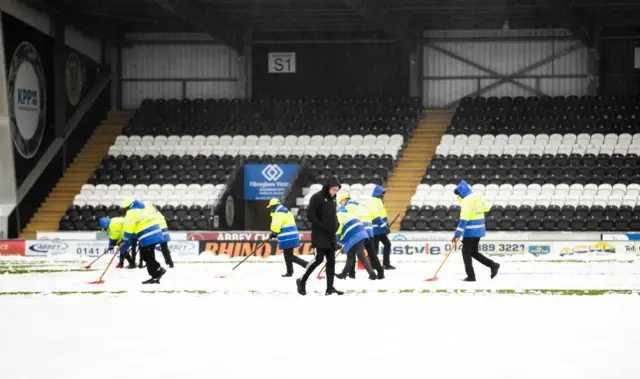 Sweeping of snow at St Mirren