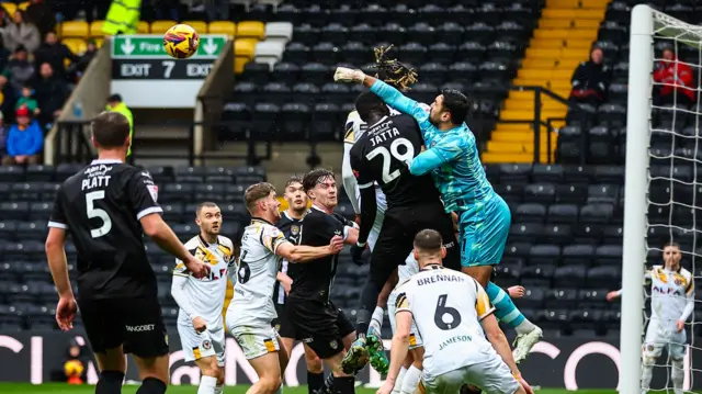 Nick Townsend makes a save for Newport County