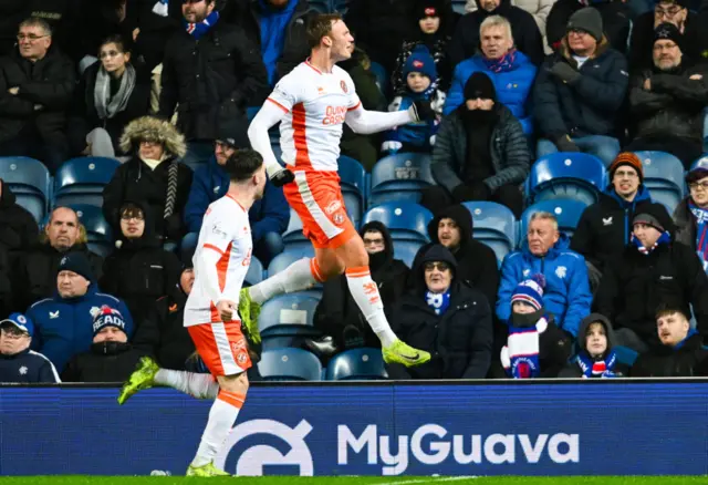 Sam Dalby celebrates his goal at Ibrox