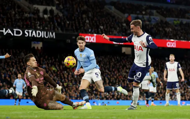 Maddison lifts the ball over Ederson