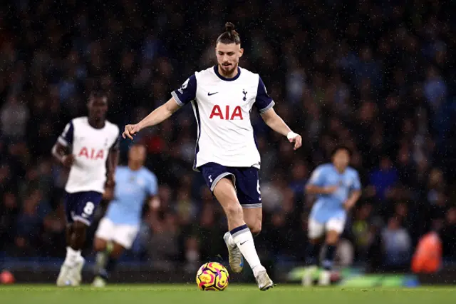 Radu Dragusin of Tottenham Hotspur controls the ball