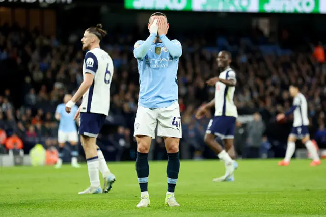 Phil Foden of Manchester City looks dejected