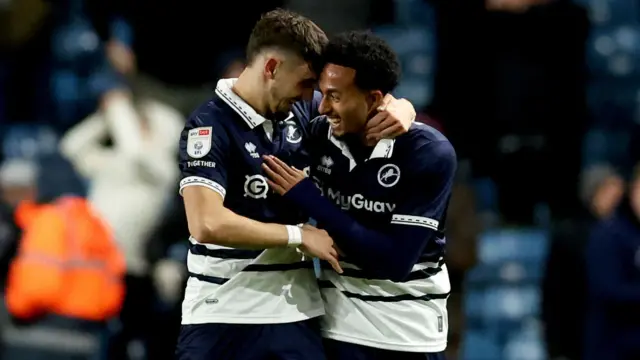 Millwall's Femi Azeez (right) celebrates with teammate Ryan Leonard