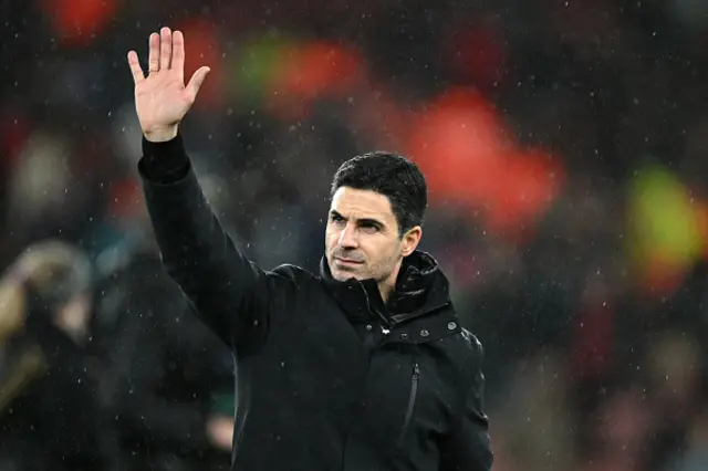 Mikel Arteta, Manager of Arsenal, acknowledges the fans