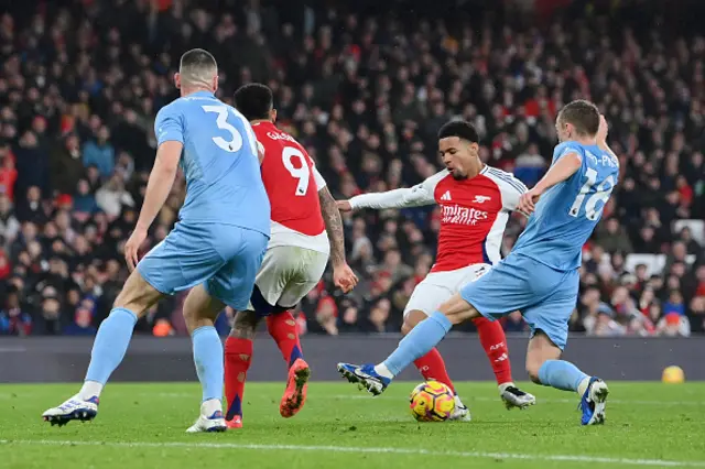 Ethan Nwaneri of Arsenal scores