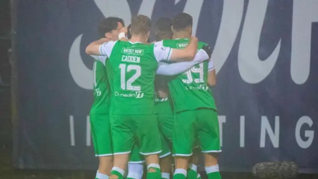 DUNDEE, SCOTLAND - NOVEMBER 23: Hibernian's Nicky Cadden celebrates with teammates after scoring to make it 1-0 during a William Hill Premiership match between Dundee and Hibernian at the Scot Foam Stadium at Den's Park on November 23, 2024, in Dundee, Scotland. (Photo by Euan Cherry / SNS Group)