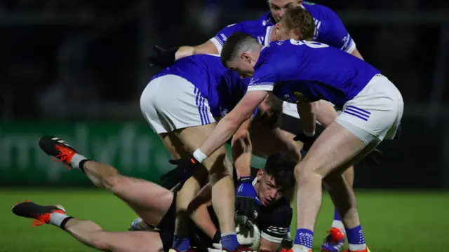 A tussle for possession in Saturday night's semi-final