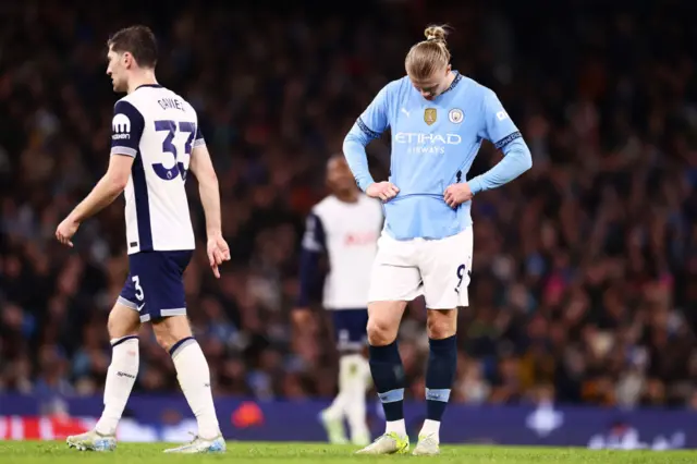 Haaland looks at the floor after another miss