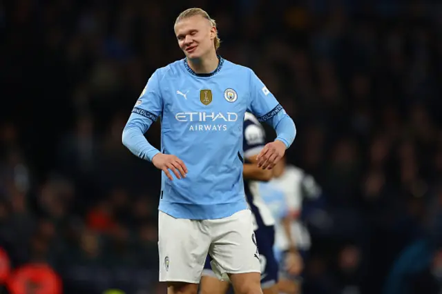 Erling Haaland of Manchester City looks on