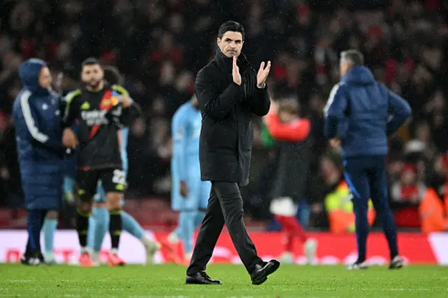 Mikel Arteta, Manager of Arsenal, applauds the fans