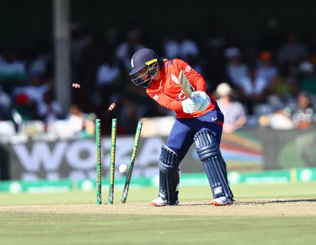 Danni Wyatt-Hodge is bowled by Nadine de Klerk