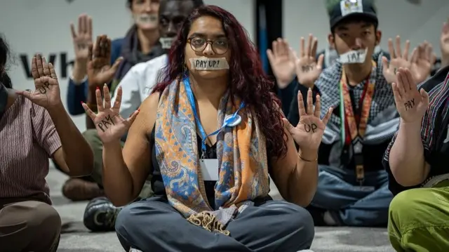 Climate activists at a demonstration at COP29 in Baku