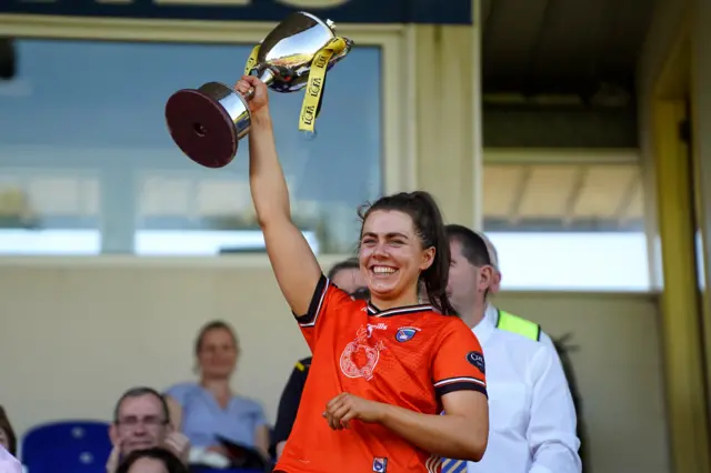 Armagh captain Clodagh McCambridge holds the Ulster Championship trophy aloft after the county's victory over Donegal in this year's final