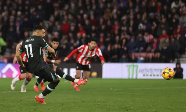 Salah scores from the spot to put Liverpool ahead