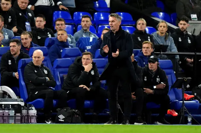 McKenna applauds his side from the touchline