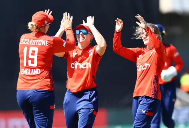 Charlie Dean celebrates the wicket of Sune Luus