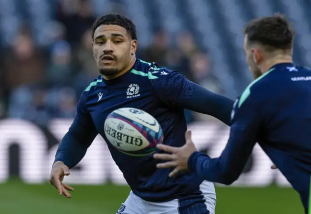 Sione Tuipulotu warming up at Murrayfield