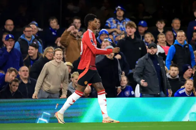 Rashford walks back to kick off