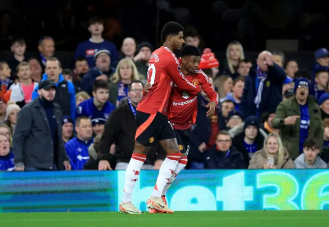 Rashford and Diallo celebrate their combination for the opener