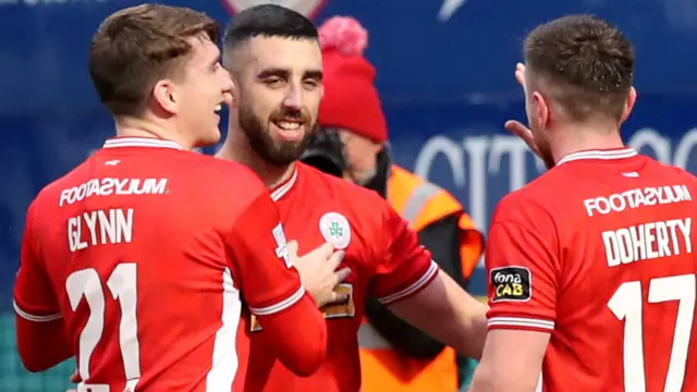 Joe Gormley is congratulated by Cliftonville team-mates Micheal Glynn and Ronan Doherty after notching one of his three goals against Loughgall