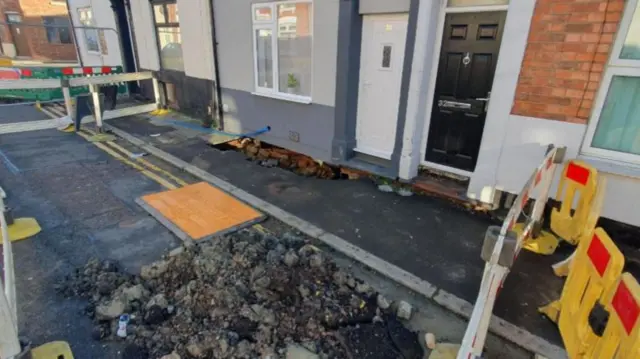 Possible sinkhole in front of house