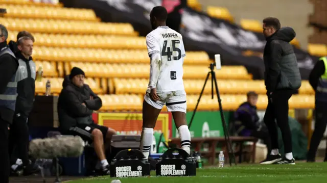 Port Vale's Rekeem Harper heads down the tunnel after being sent off against Crewe