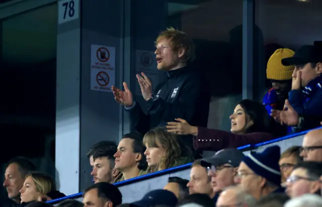 Ed Sheeran clapping during Ipswich's draw with Manchester United