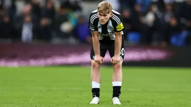 Lewis Hall of Newcastle United reacts at full time