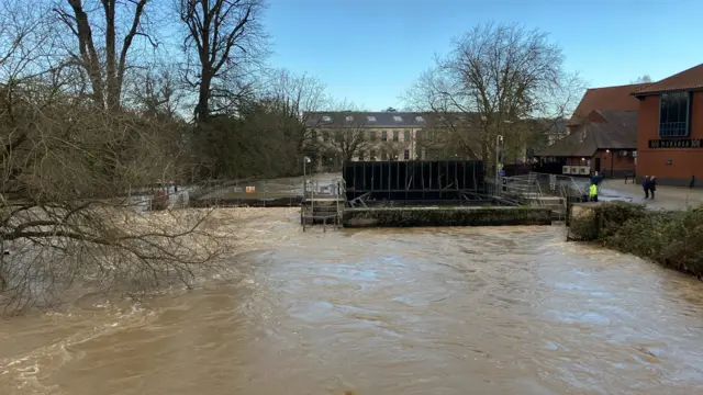 Water drainage into the river overwhelming the banks