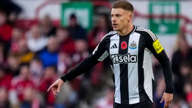 Harvey Barnes of Newcastle United gestures during a Premier League