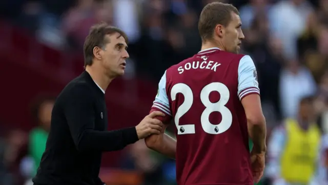 Julen Lopetegui talks to Tomas Soucek of West Ham United