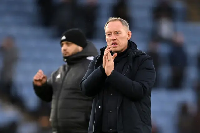 Steve Cooper claps to the Leicester fans following the Foxes' 2-1 defeat to Chelsea