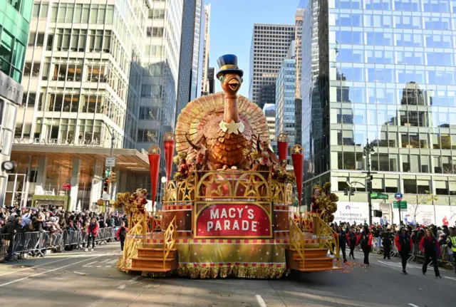 A giant turkey parade float on a New York street