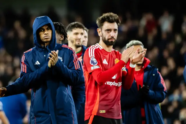 Marcus Rashford and Bruno Fernandes clap at the Manchester United fans after drawing with Ipswich