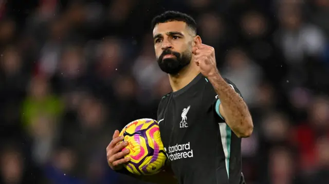 Mo Salah celebrates after scoring Liverpool's second goal against Southampton.