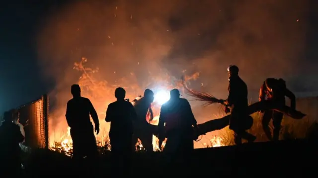 Protesters set fire to bushes on Sunday night