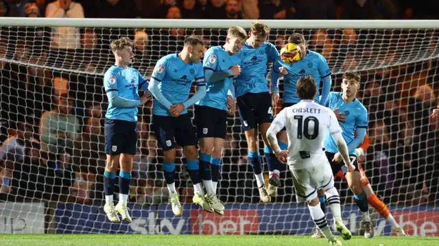 Ethan Chislett's free-kick for Port Vale hits the Crewe defensive wall