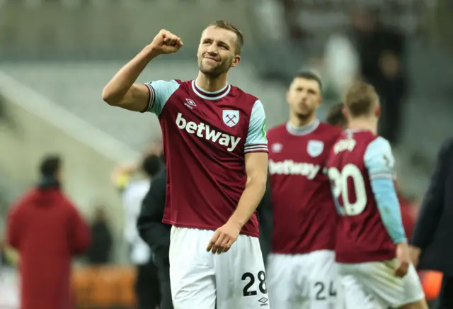 Tomas Soucek celebrates in front of West Ham's fans after beating Newcastle