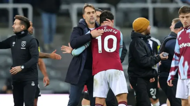 Julen Lopetegui hugs Lucas Paqueta after West Ham's win at Newcastle